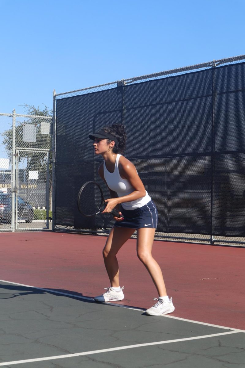 Stephanie Lopez playing the first singles match at a home game.