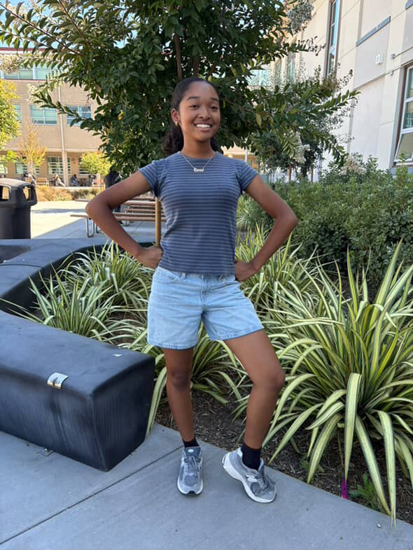 Cheerleader Promise Winston on the quad at San Leandro High