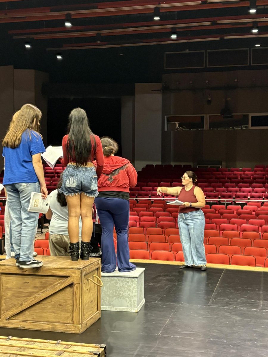 Roberta Inscho directs scene of "Peter and the Starcatcher".