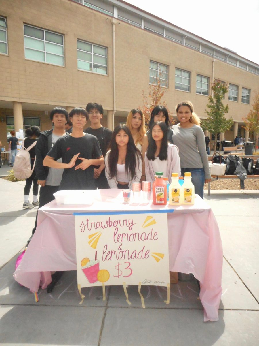 Students from Operation Smile selling lemonade at Setting Sail.