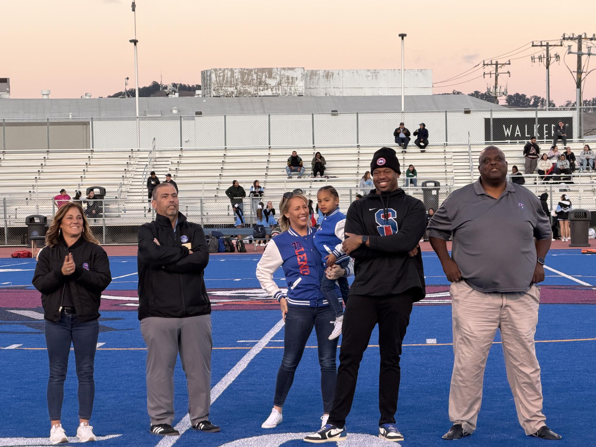 Mr. Leno with his family and San Leandro High Staff